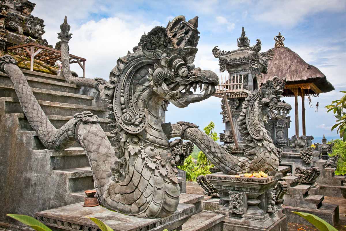 Where to Stay in Ubud: 5 Stunning Resorts 21 Dragon monster secure the entrance of Pura Padmasana Puja Mandala Temple. Nusa Dua, Bali . Indonesia