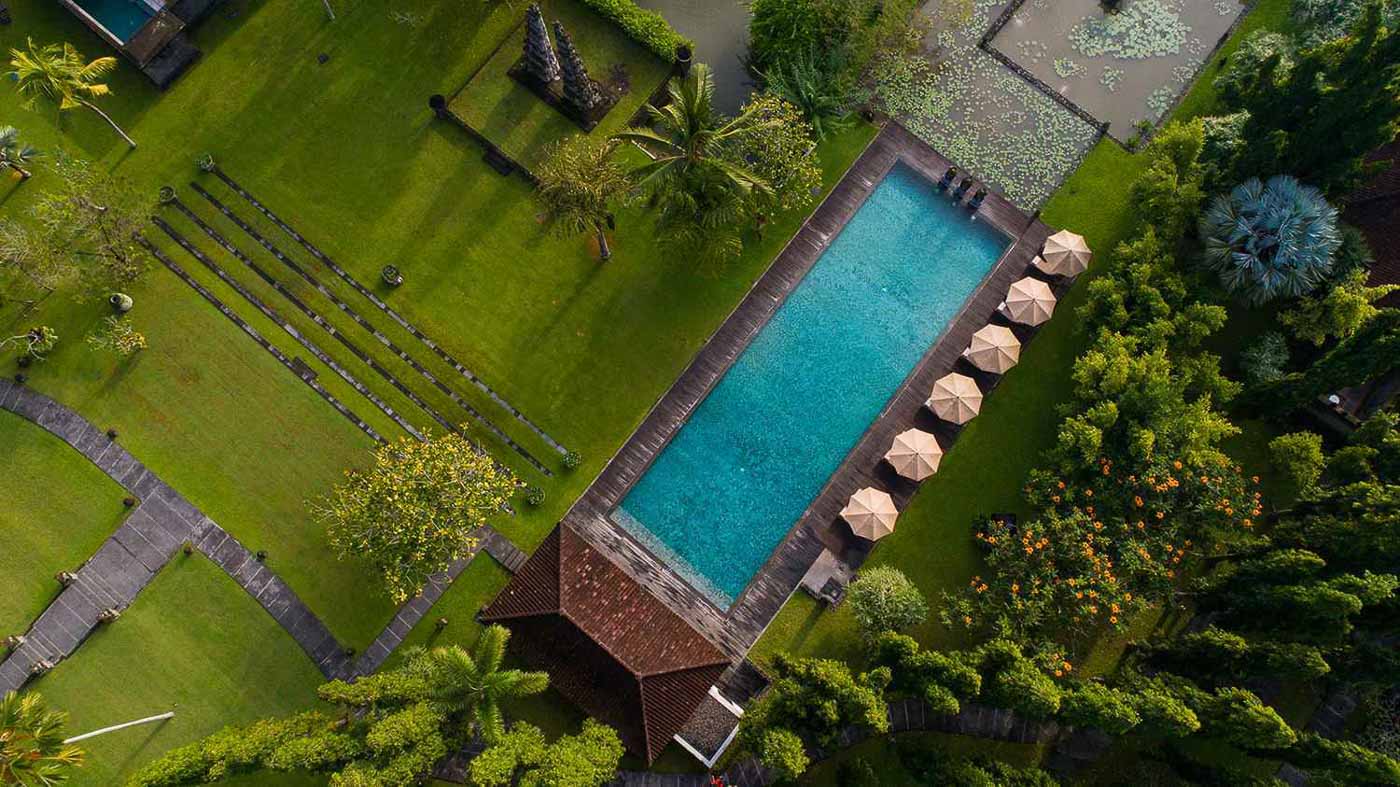 170 Bucket List Ideas for Travel Lovers to do before they Die 230 tanah resort aerial swimming pool ubud bali