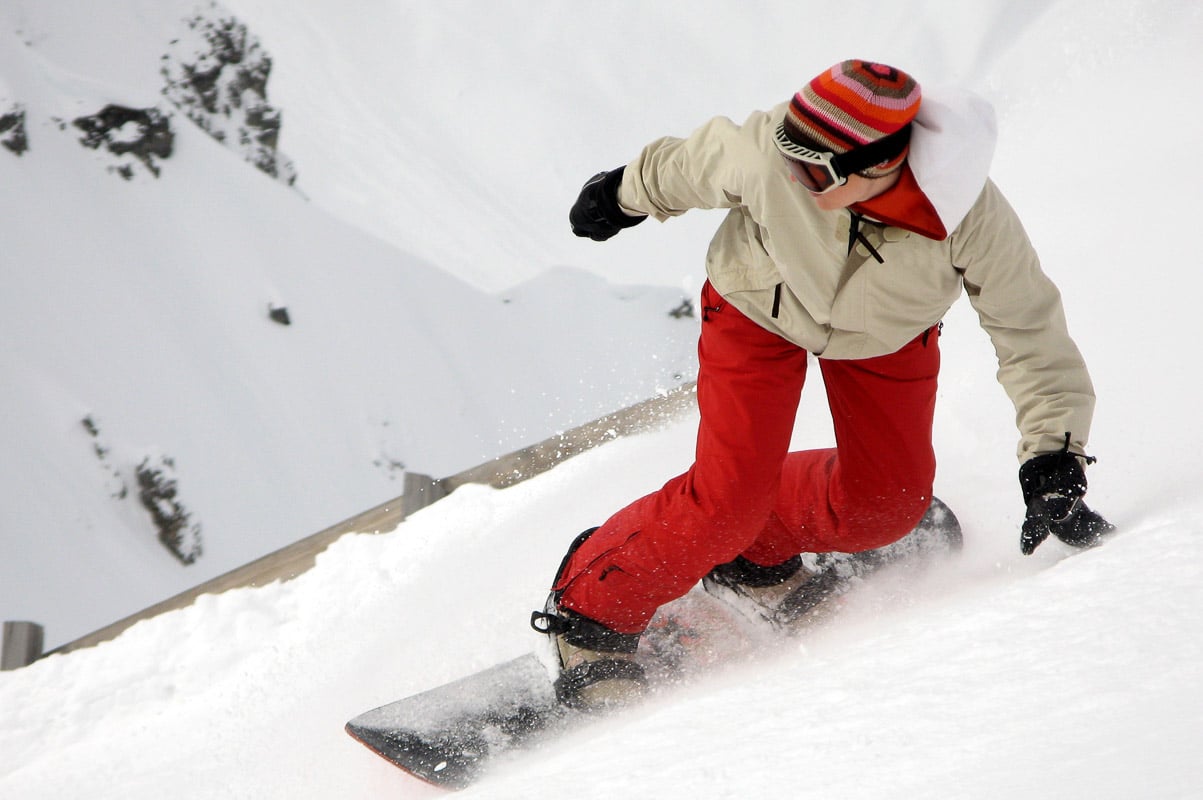 Ultimate Singles Ski Holiday Guide 6 solo snow boarder on an angle