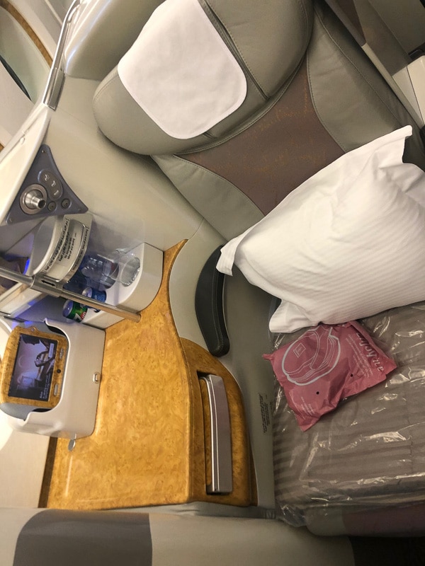 Emirates Business Class Review: Is it Worth It? 19 emirates business class a380 seat and side rest