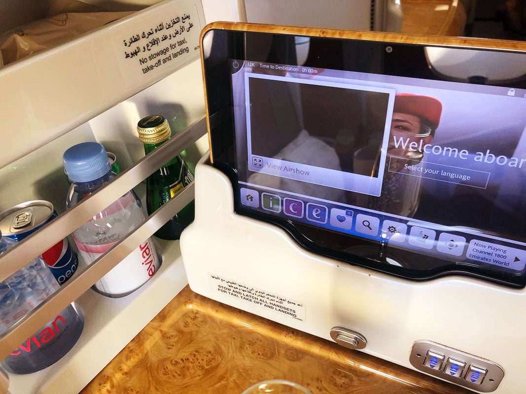 Emirates Business Class Review: Is it Worth It? 7 emirates entertaiment screen and side seat drinks business class