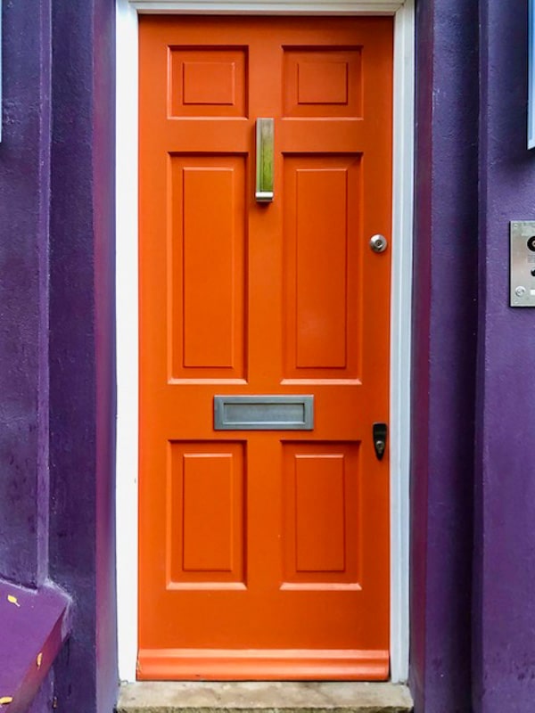 14 Fantastic Things to do in Notting Hill 26 Notting Hill London orange door of purple house