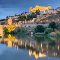 Toledo, Spain old town skyline at the Alcazar on the River.
