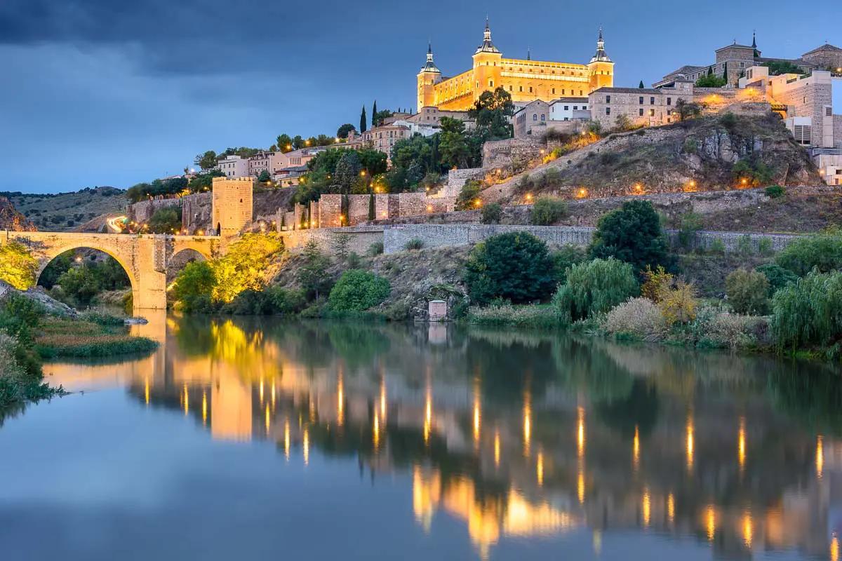 Toledo, Spain old town skyline at the Alcazar on the River.