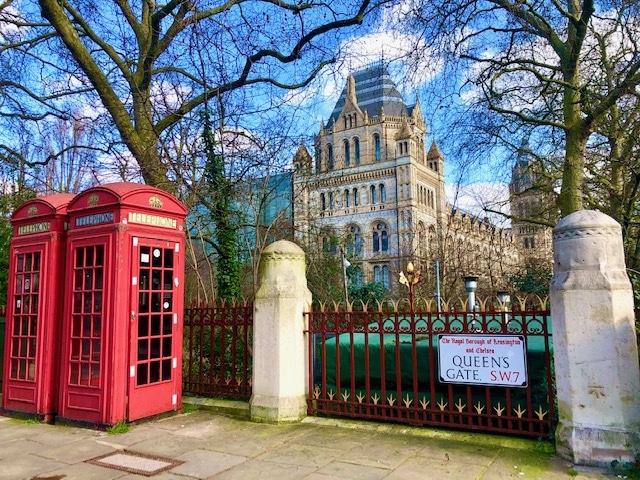 45 Impressive English Landmarks You Will Want to See 73 Natural History Museum London with red phone booths