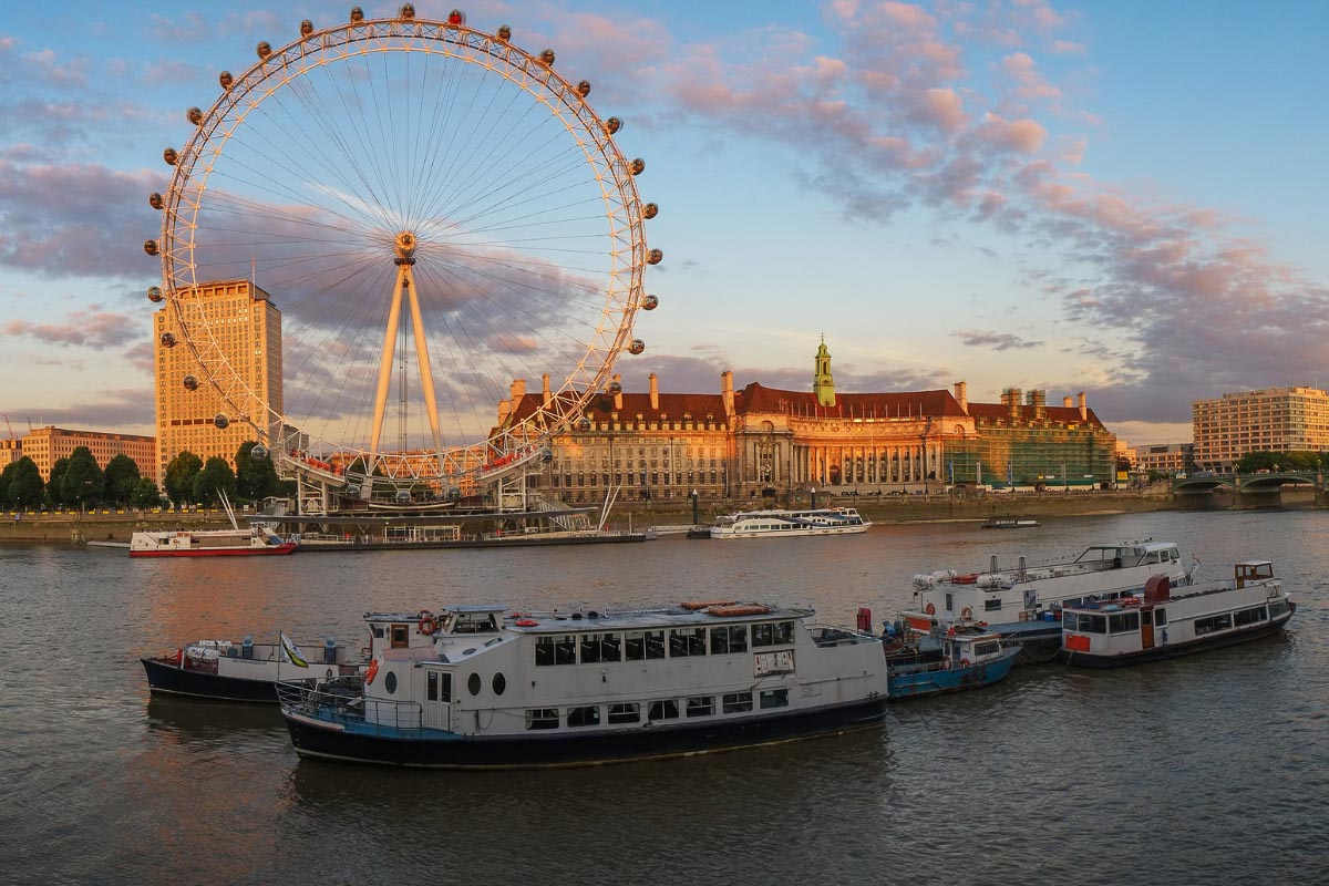15 Best Places to see Sunsets in London from a Local 13 boats on the thames and the eye sunset in london