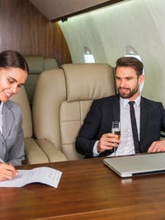 man and woman cheap flights business class