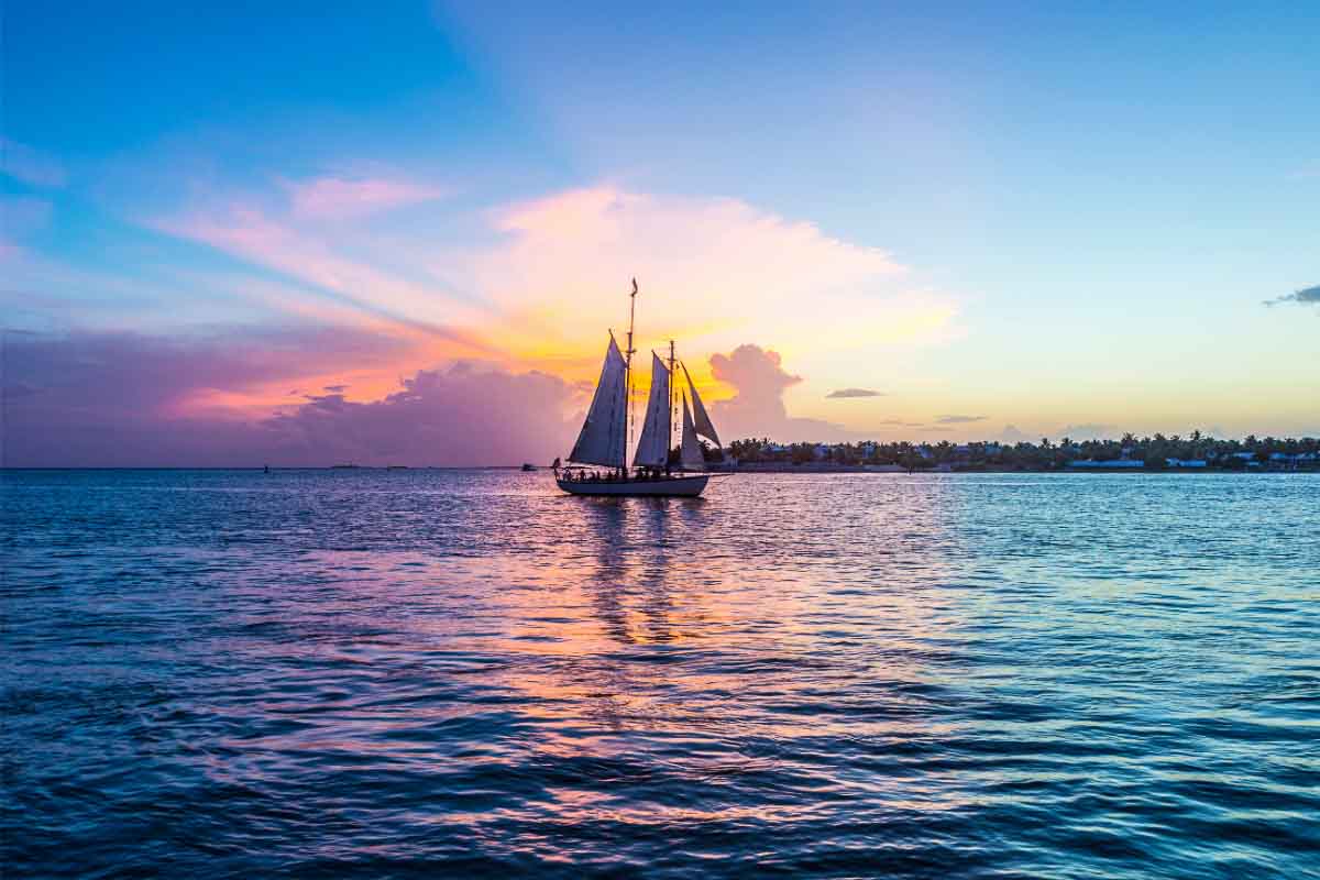 36 Warm Winter Getaways in the USA (2023) You'll Love 23 key west sunset boat