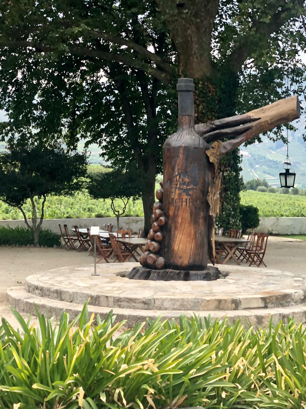 15 Fantastic Vineyards in Portugal (2022) You'll Love 6 douro valley quinta da pacheca bottle sculpture