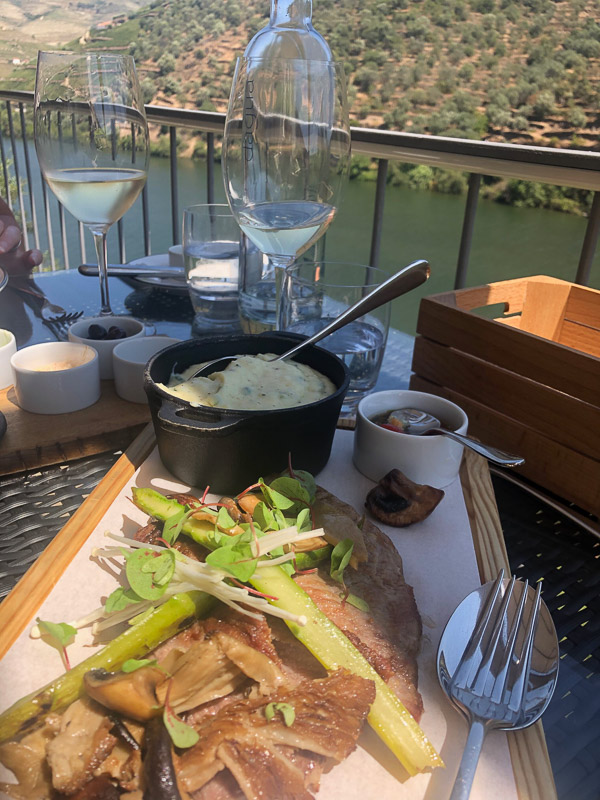 15 Fantastic Vineyards in Portugal (2022) You'll Love 8 douro valley quinta de la rosa lunch on terrace