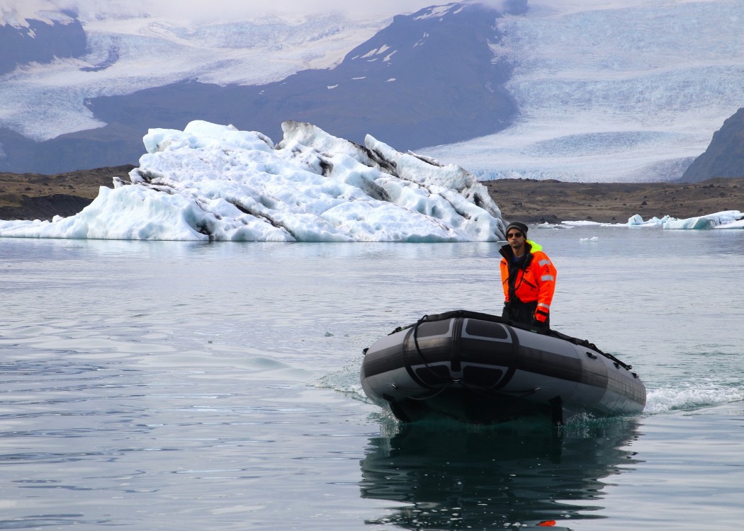 24 World Heritage Sites in the US (2023) for Your Bucket List 21 glacier-bay-with-man-in-boat